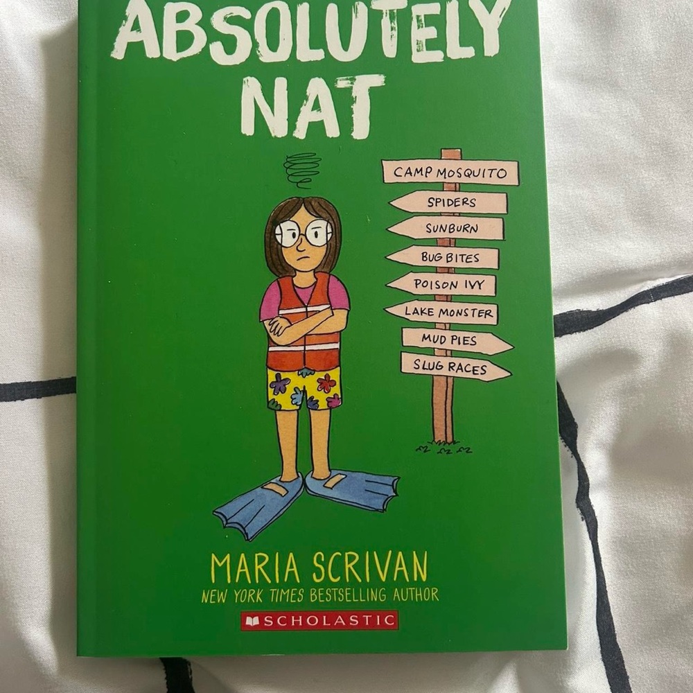 Scholastic Green Graphic Novel with Colorful Illustrations